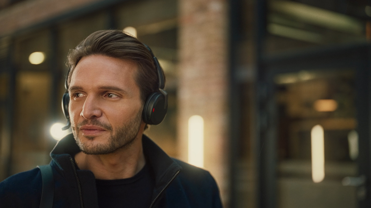 Man with Jabra Evolve2 65 Flex headset